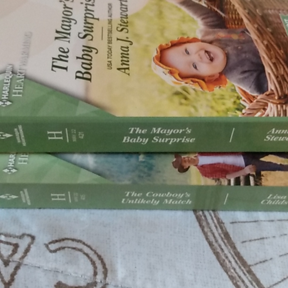 Set of 2 paperback Harlequin books.